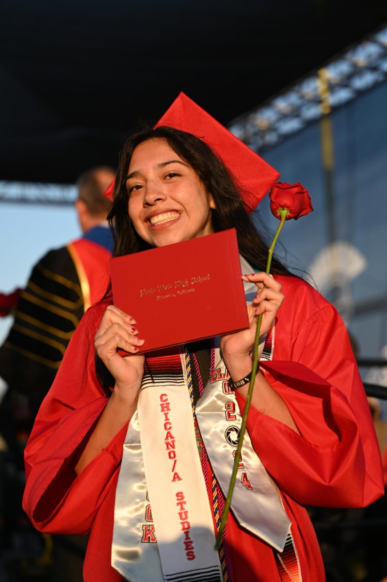 Rut Galvan leaves the stage holding her diploma at the 2024 Senior Graduation at Norte Vista High School on May 31, 2024. (Photo by Mia Mendez Avalos)