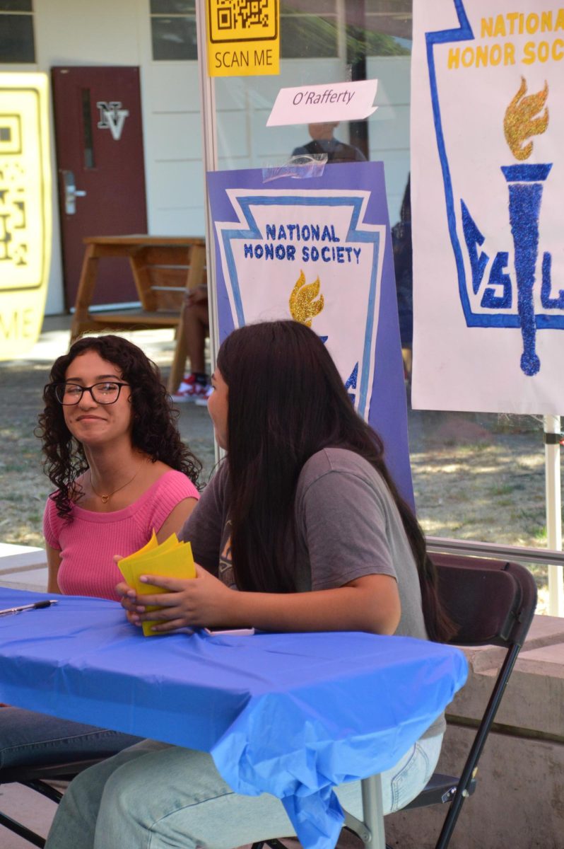 Karla Farfan and Joselyn Reyes man the National Honor Society club booth at Club Rush on August 13, 2024.