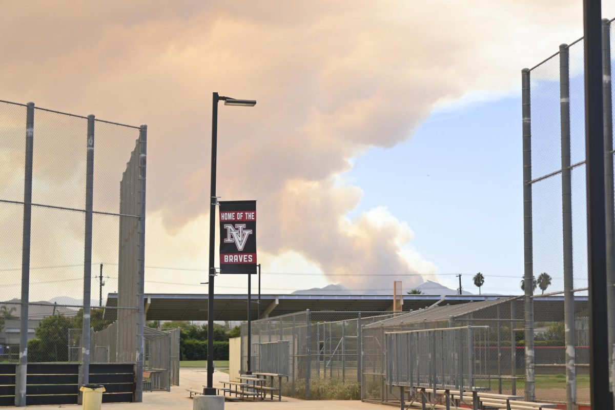 The Airport Fire in Trabuco Canyon, Orange County leaves a trail of smoke and an orange tint in the sky on September 10, 2024.