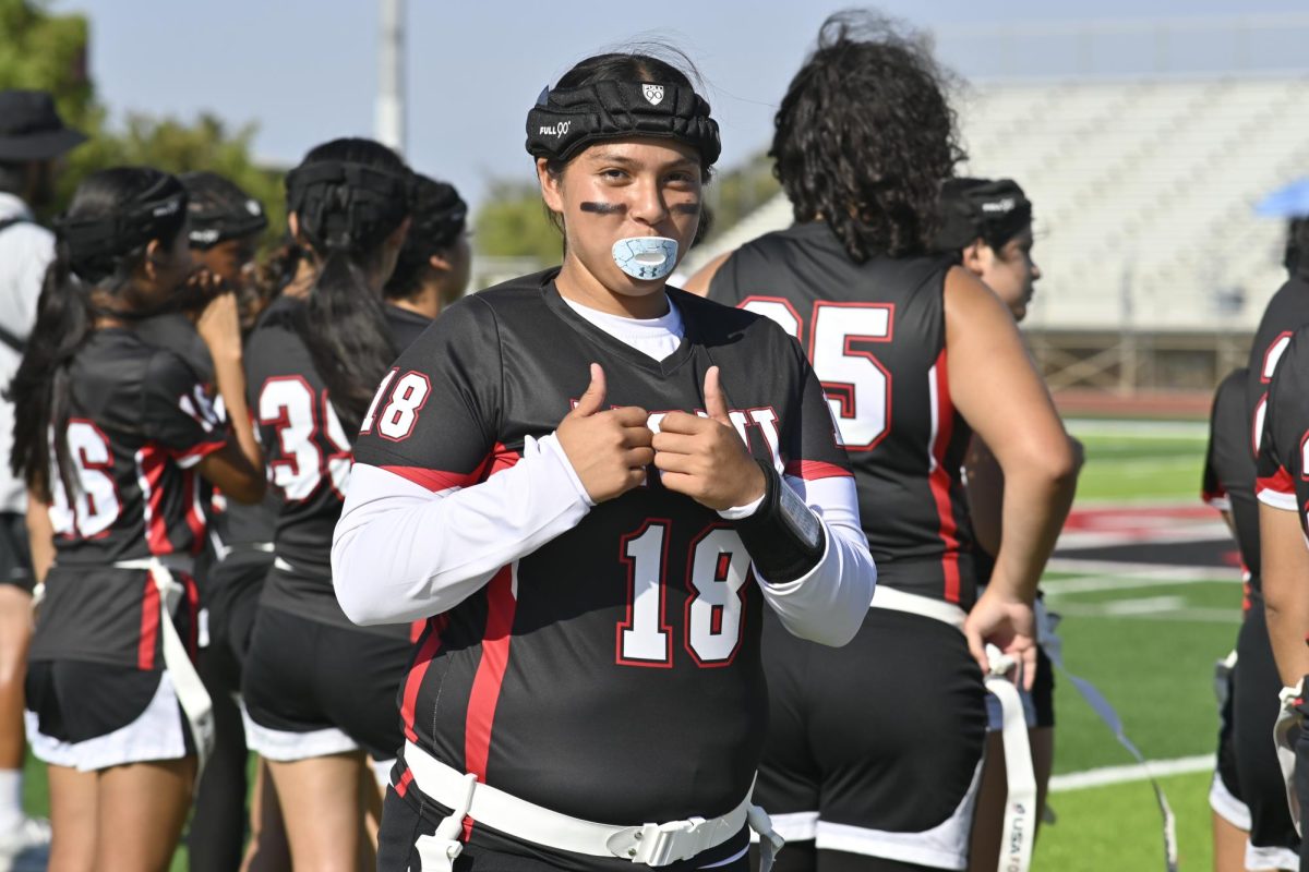 Abigale Acosta preparing for her time on the field. 