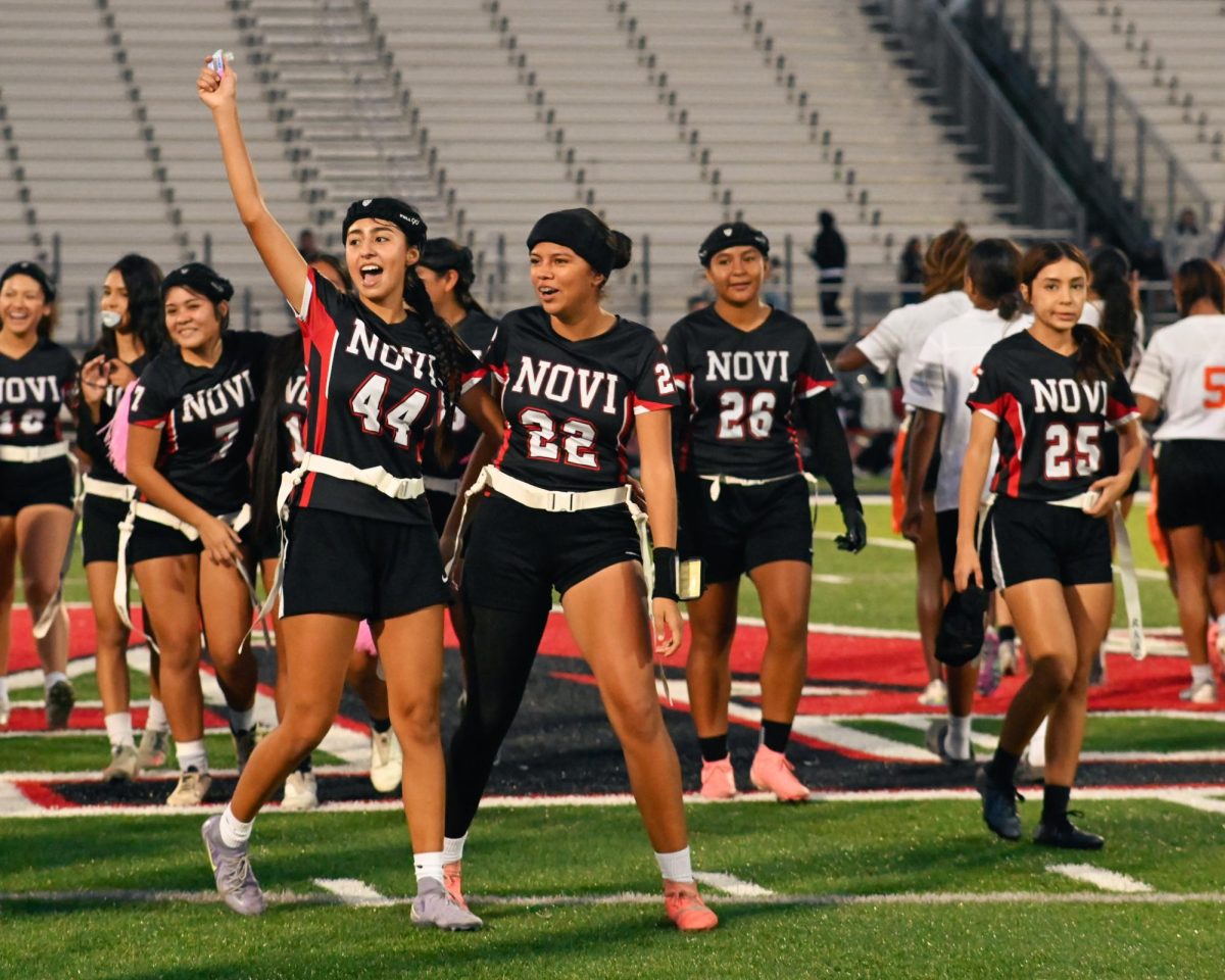Varsity Girls celebrating the end of their game against Orange high school.