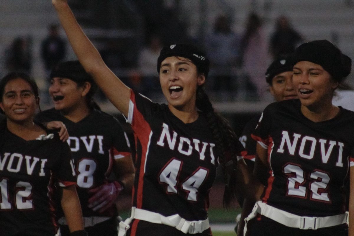 Yaretzy Evidarte cheering after their win against Orange high school with a score of 27-0.