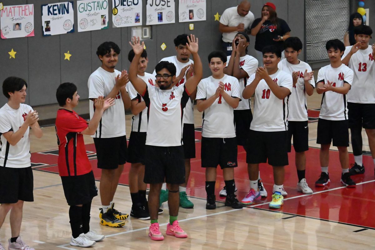 Boys Volleyball Varsity players lifting each other's spirits 
