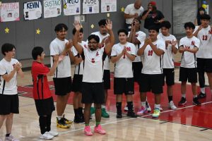 Boys Volleyball Varsity players lifting each other's spirits 