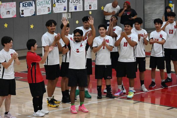 Boys Volleyball Varsity players lifting each other's spirits 